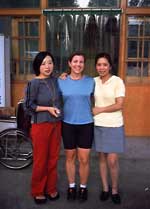 Jill and waitresses at dumpling house